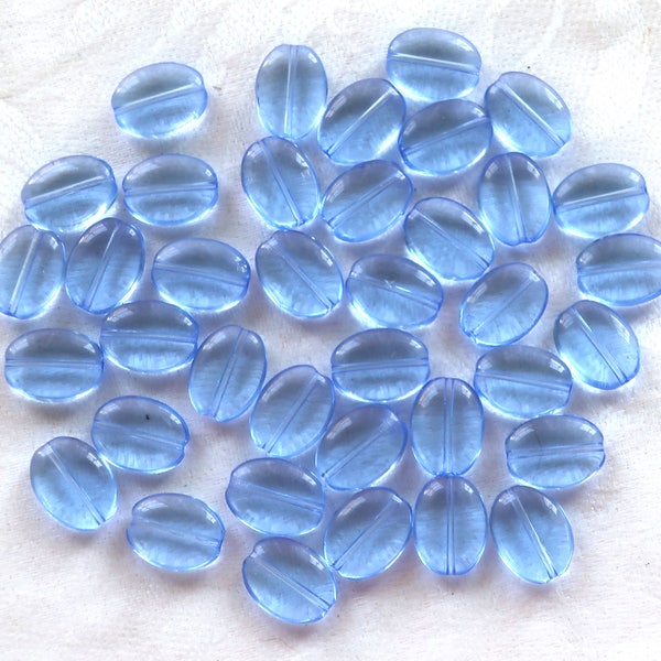 25 transparent light sapphire blue flat oval Czech Glass  beads, 12mm x 9mm pressed glass beads C6425