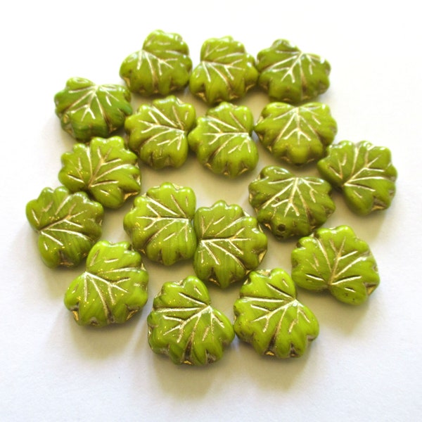 15 Czech glass maple leaf beads -  opaque bright green leaves with gold accents -  center drilled 13 x 11mm leaves C00121