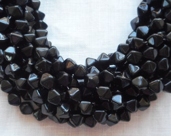 Fifty 6mm Jet Black bicone pressed glass Czech beads, C7450