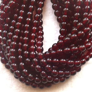 Lot of 50 6mm Czech glass druks, deep garnet red smooth round druk beads C2850