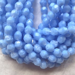 Lot of 25 6mm Czech glass beads, marbled opaque and transparent light coral blue firepolished faceted round beads C7425
