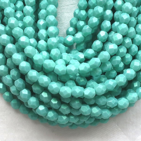 Lot of 50 4mm Opaque Aqua Glow Turquoise Czech glass beads, firepolished, faceted round beads, C3601