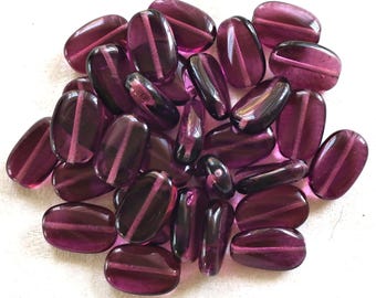 Lot of 15 transparent Amethyst, Purple slightly twisted oval Czech Glass beads, 14mm x 8mm pressed glass beads C00411