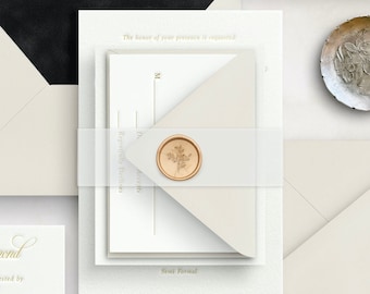 May include: A white wedding invitation with a gold wax seal and a floral design. The invitation is on a white background with a black envelope and a silver dish with a floral design.