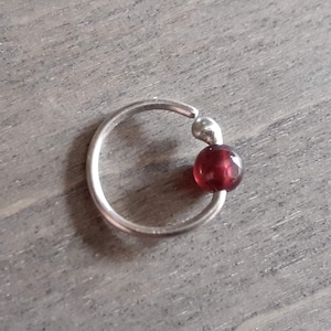 Helix hoop in silver 935, Argentium earring with garnet, hoop for daith, helix, tragus piercing jewelry in 20, 18, 16 gauge
