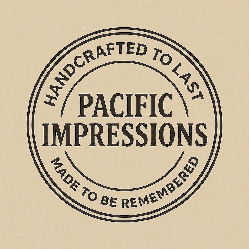 A black and white circular logo with the text "HANDCRAFTED TO LAST" and "PACIFIC IMPRESSIONS" inside it.