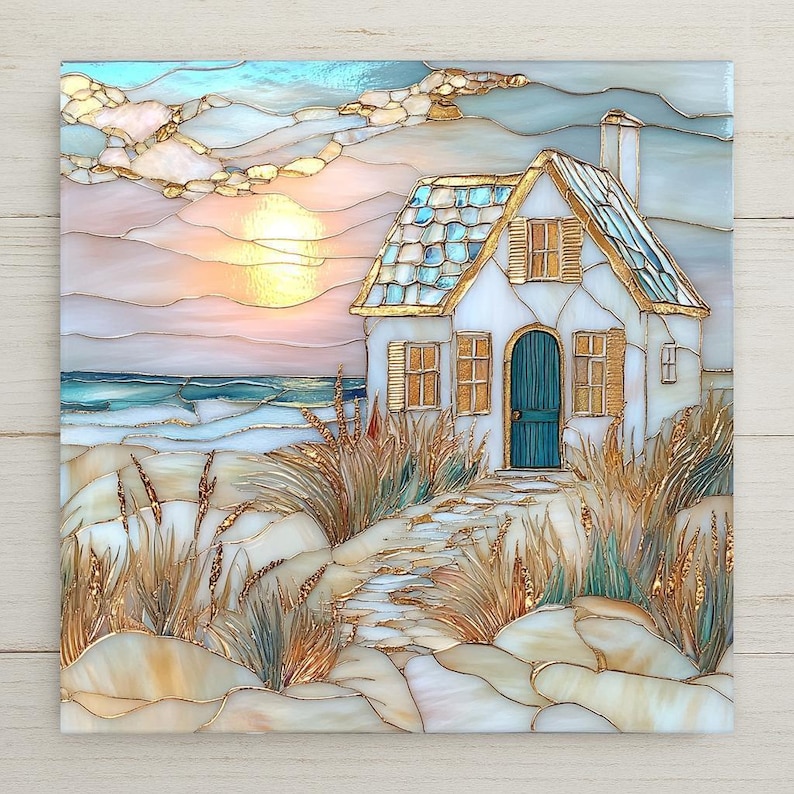 This stained glass-style ceramic tile features a coastal cottage and beach sunset in soft pastel hues. A perfect beach house accent or gift.