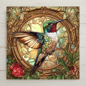 May include: A stained glass style hummingbird with green, blue, and brown feathers. The hummingbird is perched on a branch inside a gold frame with a colorful stained glass background.
