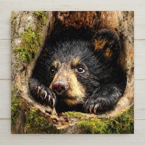 May include: An oil painting on canvas depicting a black bear cub peering out from a hollow tree trunk. The cub has dark fur with tan highlights around its muzzle and ears, and its paws are visible resting on the edge of the textured, mossy wood.