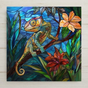 May include: A colorful stained-glass artwork featuring a chameleon perched on a branch. The chameleon displays a vibrant mix of yellow, orange, blue, and green hues. The background includes lush foliage and flowers in shades of orange, red, and green.
