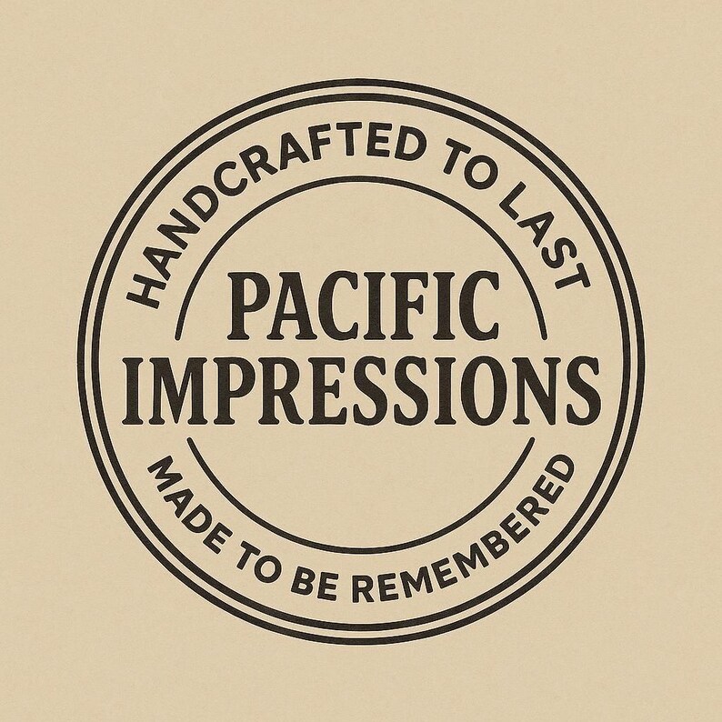 A black and white circular logo with the text "HANDCRAFTED TO LAST" and "PACIFIC IMPRESSIONS" inside it.