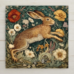 May include: A square wall art print featuring a brown hare leaping through a dense garden of dark green foliage, large red poppies, and pale yellow flowers. The detailed illustration showcases the hare in profile with textured fur.