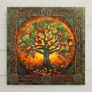 May include: A square wall art piece featuring a central tree with twisted roots and branches, displaying autumn leaves in shades of red, orange, yellow, and green. The tree is set against a glowing golden circular background, framed by a dark green border with intricate, repeating brown Celtic knotwork patterns.