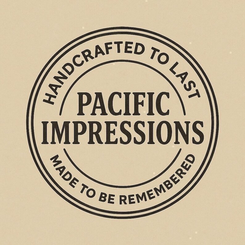 A black and white circular logo with the text "HANDCRAFTED TO LAST" and "PACIFIC IMPRESSIONS" inside it.