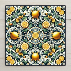 May include: A square decorative tile featuring a symmetrical pattern of yellow lemons and sliced lemon halves interspersed with intricate white and dark blue scrollwork, green leaves, and small white blossoms arranged in a repeating floral motif.