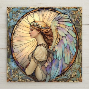Elegant Guardian Angel ceramic tile in stained glass style. Features soft pastel wings, floral crown, and golden halo. Perfect spiritual gift for memorials, baptisms, or Christian decor. Optional tile wall hanger or stand available.