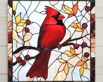 May include: A square stained glass panel featuring a vibrant red cardinal bird perched on a dark branch. The bird is surrounded by yellow and orange leaves and small red berries against a white background, all enclosed in a dark brown frame.