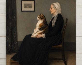 May include: A framed print depicting an elderly person in a black dress and white lace head covering sitting on a wooden chair, holding a large brown and white tabby cat. A small framed landscape painting hangs on the gray wall in the background.
