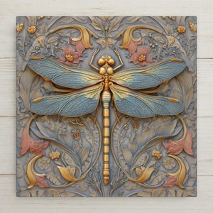 A symbolic Art Nouveau wall art ceramic tile featuring a detailed dragonfly with blue wings and gold accents surrounded by flowing floral patterns. This nature-inspired home decor piece represents balance and transformation. The artwork is a permanent print on ceramic tile, not real stained glass. Optional tile wall hanger, easel tile stand, cork backing, and premium frame options are available.