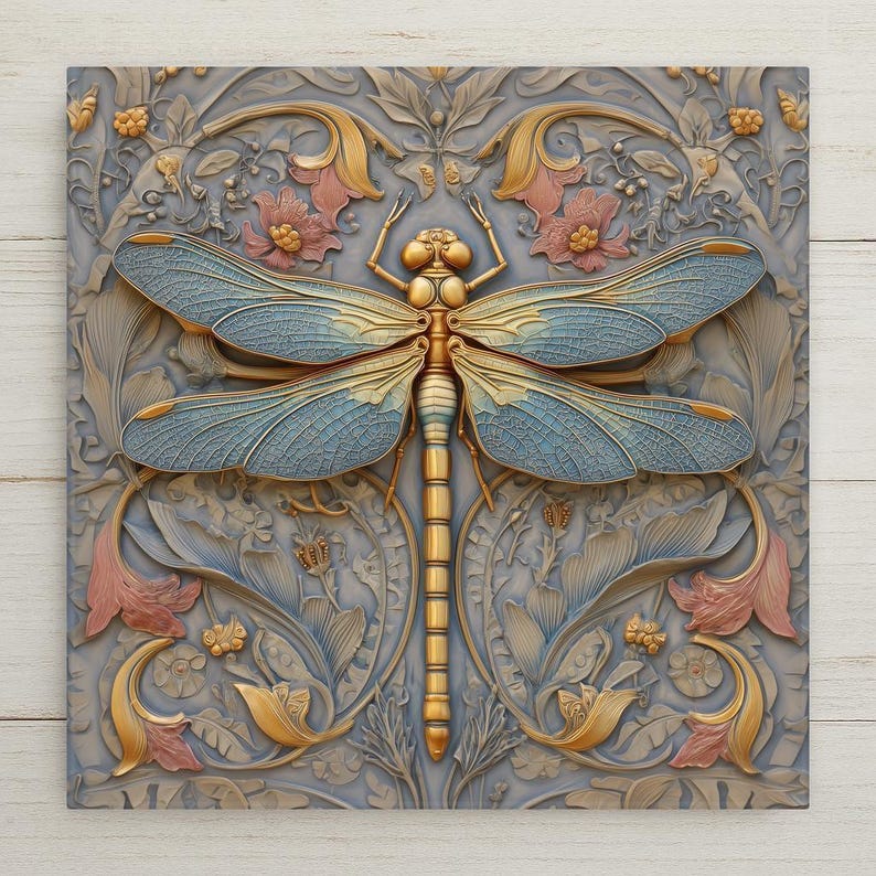 A symbolic Art Nouveau wall art ceramic tile featuring a detailed dragonfly with blue wings and gold accents surrounded by flowing floral patterns. This nature-inspired home decor piece represents balance and transformation. The artwork is a permanent print on ceramic tile, not real stained glass. Optional tile wall hanger, easel tile stand, cork backing, and premium frame options are available.