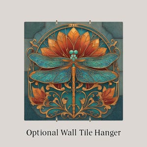 May include: A square decorative tile featuring a central dragonfly with teal wings and a gold body, positioned over a large orange flower. The design includes intricate gold filigree accents against a teal background. Text reads Optional Wall Tile Hanger.