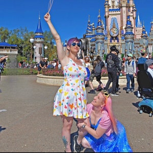 Mickey balloon dress and Hidden Mickey Pixiedust dress
