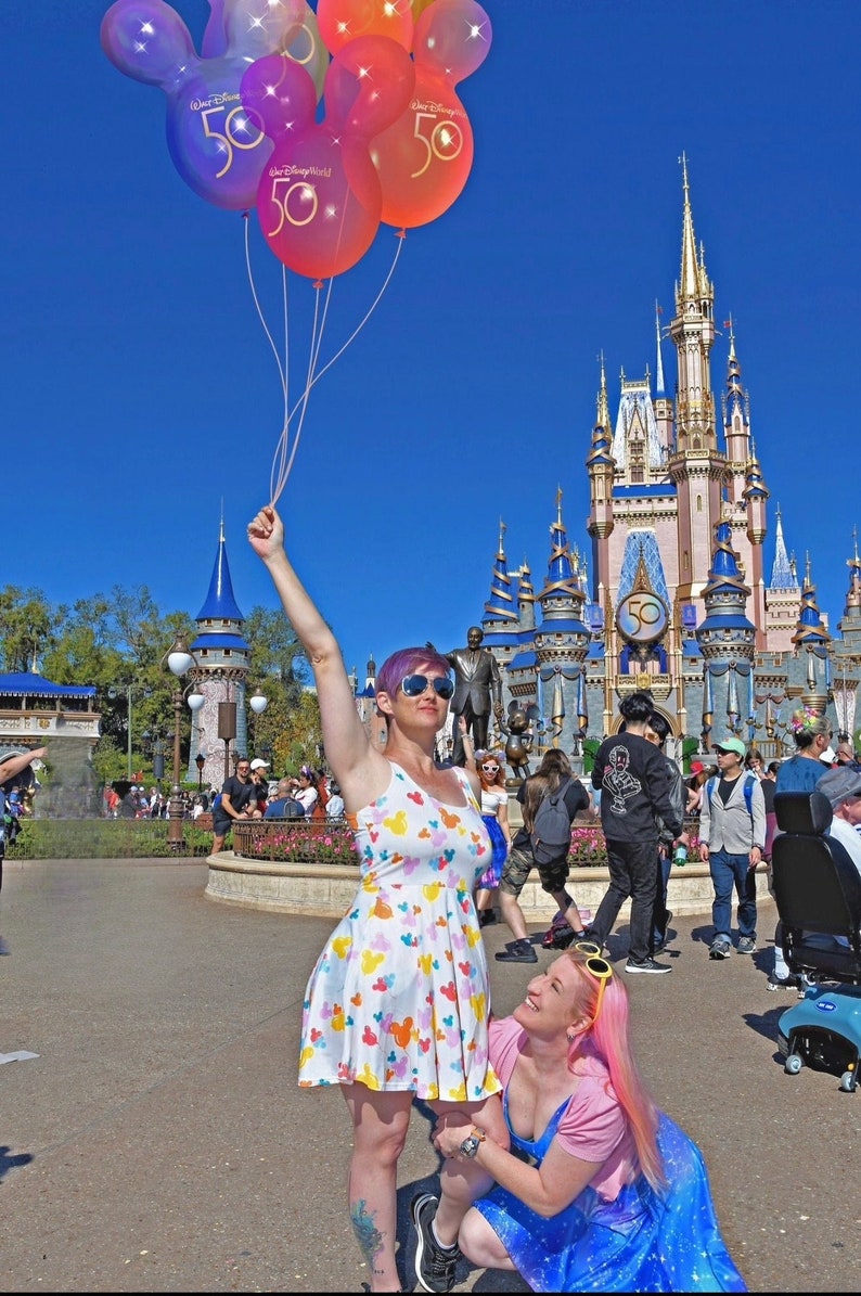 Mickey balloon dress and Hidden Mickey Pixiedust dress