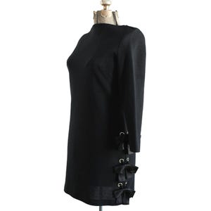 1960s Medium Black Wool Knit Mini Dress: Rhinestone Bow Detail, Abellá Paris