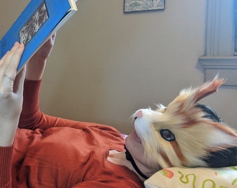 Máscara de piel sintética atigrada naranja