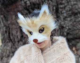 Máscara de piel sintética de mapache rubio