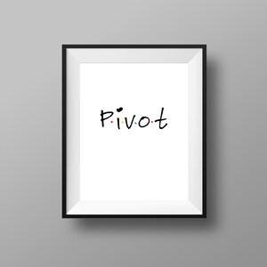 May include: A black framed print with the word "PIVOT" written in black marker with colorful dots.