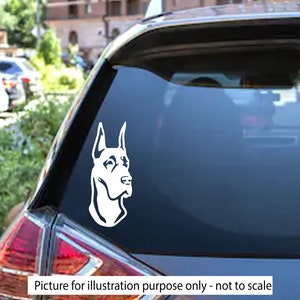 May include: White silhouette of a Doberman Pinscher dog head on a black car window.  Picture for illustration purpose only - not to scale.