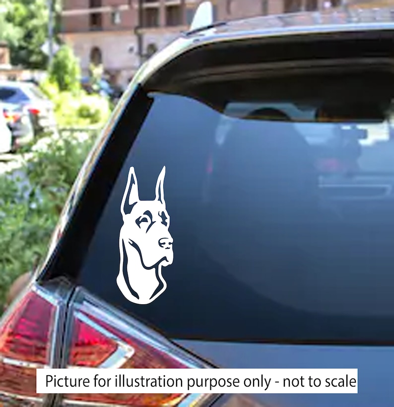 May include: White silhouette of a Doberman Pinscher dog head on a black car window.  Picture for illustration purpose only - not to scale.