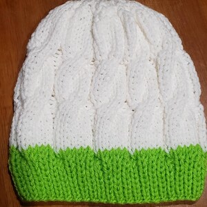 Soft white cable knit beanie with bright green brim