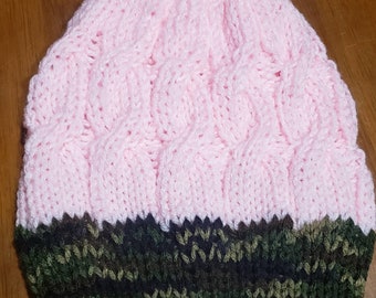 Light pink cable knit slouchy beanie with camo brim
