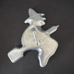Vintage aluminum metal cookie cutters—sold separately witch, bent handle