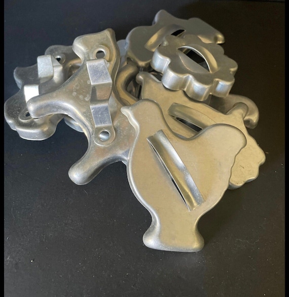 Vintage aluminum metal cookie cutters—sold separately