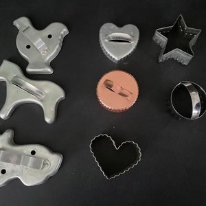 Vintage aluminum and copper metal shape and animal cookie cutters