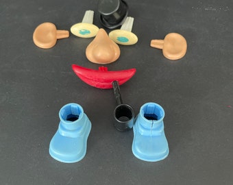 Pieces of Romper Room’s Mr. Potato Head, by Hasbro, sold separately