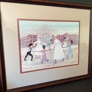 May include: Framed watercolor print depicting a group of children and adults in period clothing holding hands in a circle. The artwork is set against a backdrop of a snowy landscape and buildings.