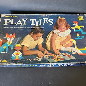 May include: Vintage HALSAM PLAY TILES game box with colorful illustrations of children playing with the tiles. The box features the text "Develops Imagination and Coordination" and "SHAPES IN 4 PRIMARY COLORS".