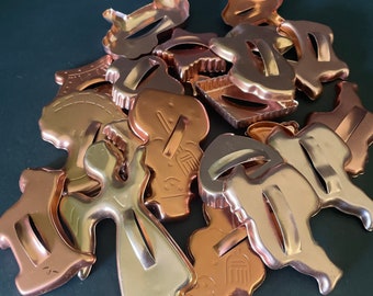 Vintage copper metal shape and Christmas cookie cutters—sold separately