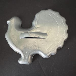 Vintage aluminum metal cookie cutters—sold separately Turkey, bent handle