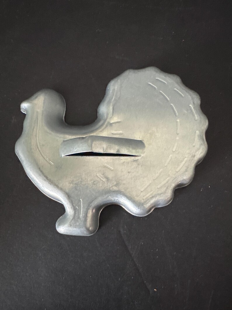 Vintage aluminum metal cookie cutters—sold separately Turkey, bent handle