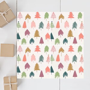 May include: A white background with a repeating pattern of colorful Christmas trees. The trees are in shades of pink, green, brown, and purple. The trees are all different shapes and sizes.