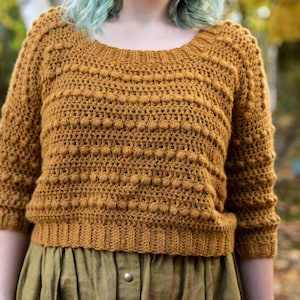 El patrón de crochet del suéter Goldfinch