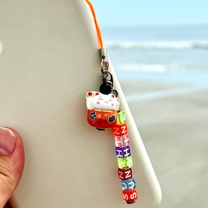 kawaii cat phone charm orange maneki neko phone charm pink lucky cat phone plug orange cute cat phone charm fortune cat money cat sakura cat