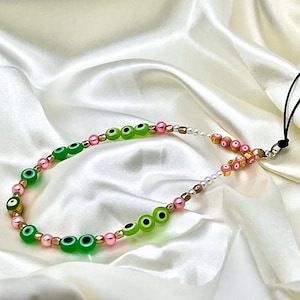 Green evil eye phone chain pink pearl phone strap custom phone wristlet phone string Y2K 90s phone accessory protection charmstrap Egypt