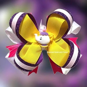 May include: A rustic wooden sign with the text "Welcome to our home" in white lettering. The sign features a distressed finish and a simple, inviting design, perfect for front door decor.