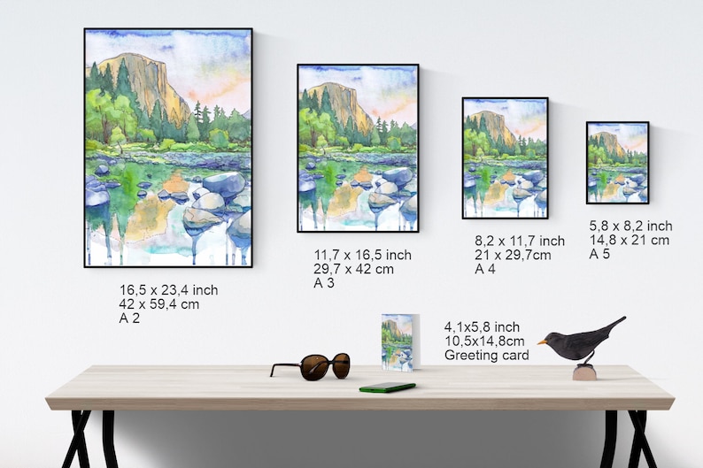 Peut inclure: Une peinture &agrave; l'aquarelle d'un paysage de montagne avec une rivi&egrave;re au premier plan. La peinture est disponible en plusieurs tailles, y compris une carte de v&oelig;ux.